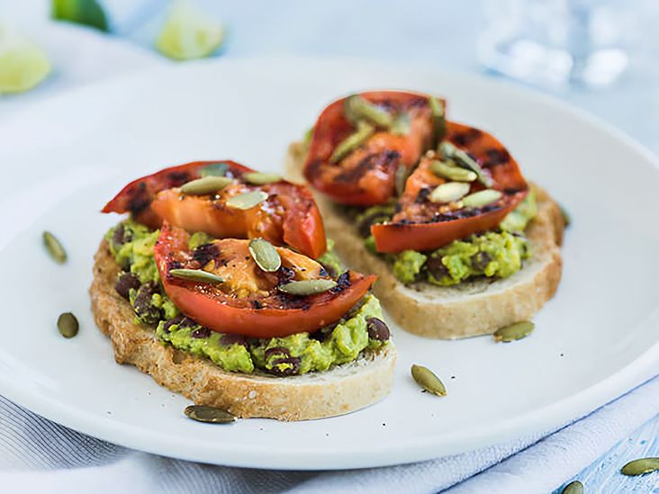 Smashed avocado and black bean sandwich